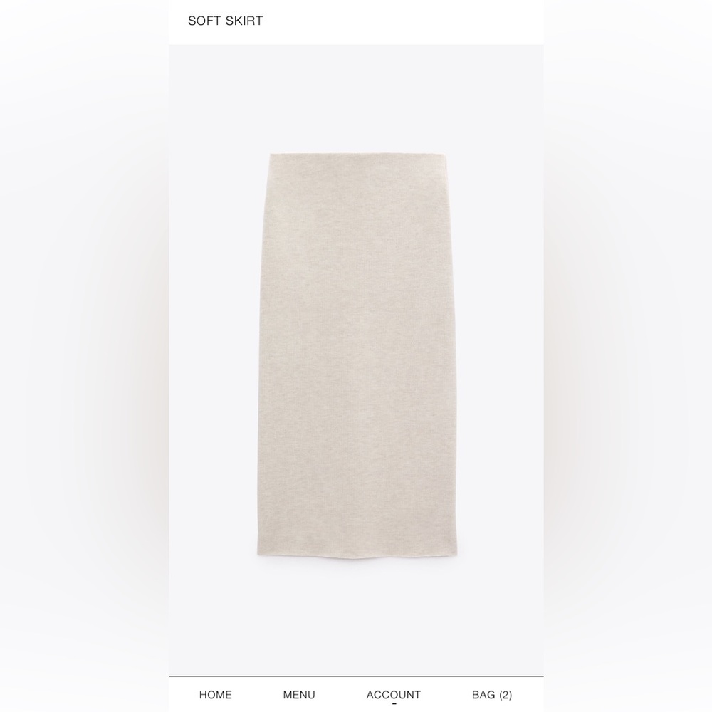 Gently used Zara Soft Pencil skirt, Size L, 56% polyester 44% cotton. Beige Marl
